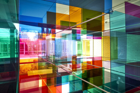 Light Shines Through a Rainbow-Tinted Geometric Panel Installation by Art Duo Luftwerk